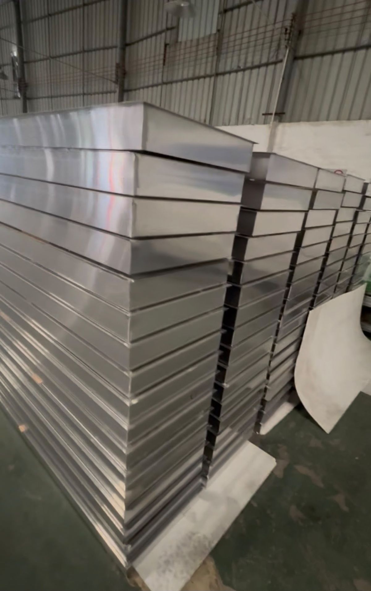 Finished aluminium panels stacked at factory